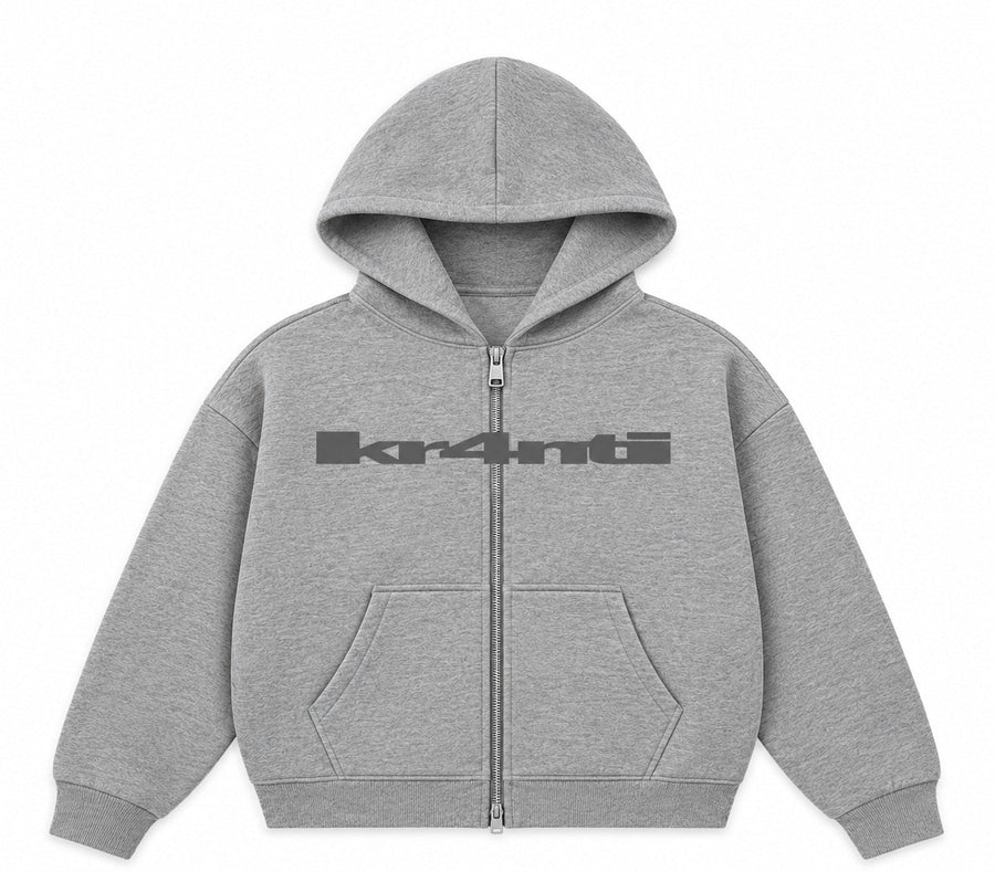 Grey boxy double-zip B4SIC ZIPUP HOODIE with a tonal grey kr4nti logo across the chest